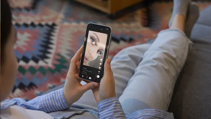 Image of a person on the couch getting a TikTok shop promo